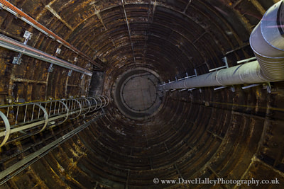Photograph of disused tunnel shaft at old section of Euston Tube Station off Melton Street, London, UK.