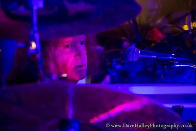 Photograph of Les Binks drumming with Broken Bones at The Prince of Wales, Surbiton, Kingston-upon-Thames, Surrey, UK on 10/03/18.