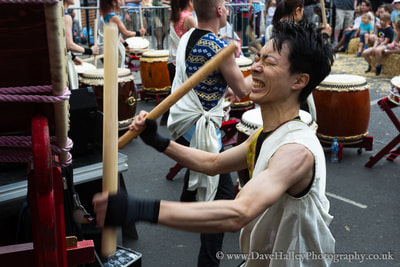 Photograph of drummer playing Japanese ō-daiko drum with Joji Hirota & The London Taiko Drummers at Whitton St. George's Day Festival 2018.